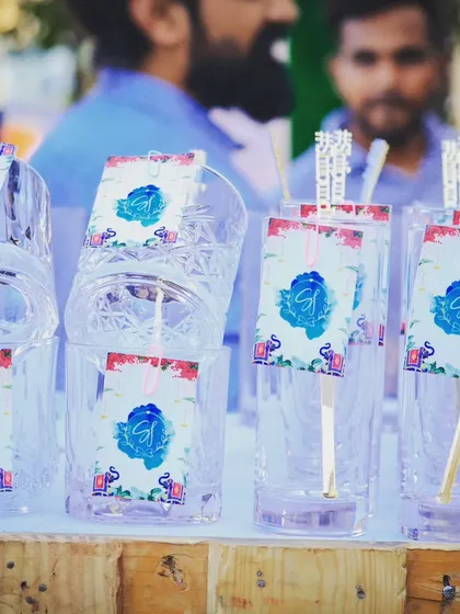 Another angle of our custom glassware. We work with you to create personalized tags that reflect your wedding's branding and style.