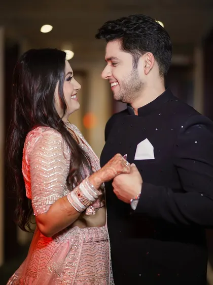 A candid moment of laughter between the couple during their formal engagement shoot. We believe the best portraits capture real emotions, and this image is a perfect example of their genuine connection.