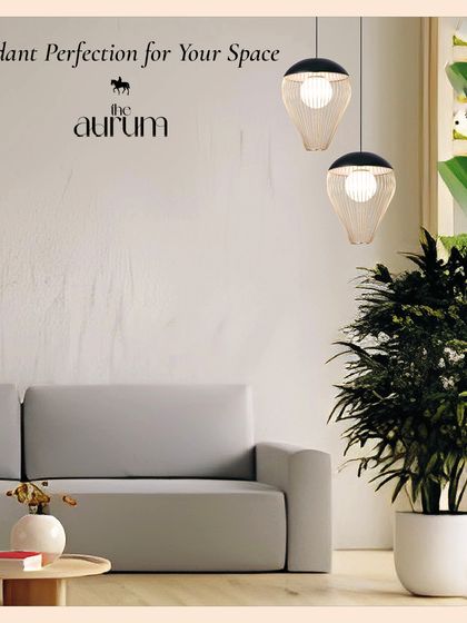 These delicate, cage-like pendant lights add a touch of airy sophistication to a calm living space. Their minimalist design provides gentle illumination without interrupting the room's serene atmosphere.