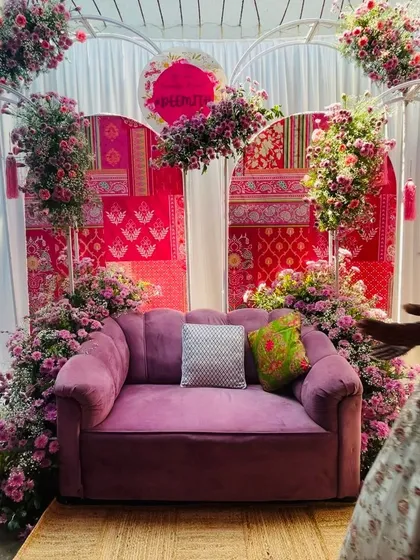 The stunning floral and fabric backdrop created the perfect setting for this client's vibrant mehndi party.