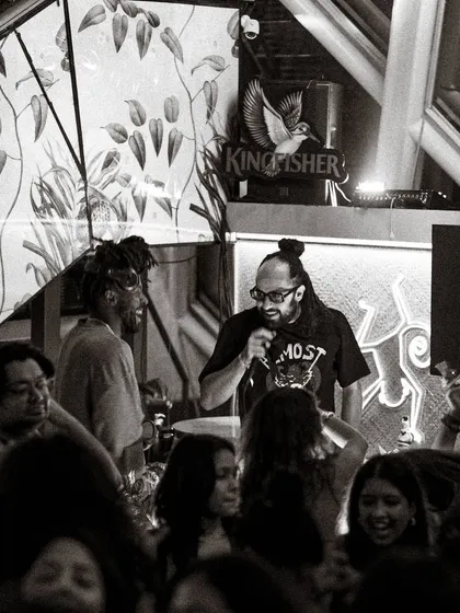 More than just a DJ, I’m an MC rooted in sound system culture. This shot captures me on the mic, hosting the night and keeping the crowd's energy high. I can run the show or just hype the vibe, whatever the event needs.
