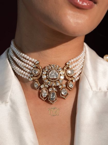 This Diwali, play your cards right and let pearls be your winning hand. A close-up of our signature Polki and pearl choker.