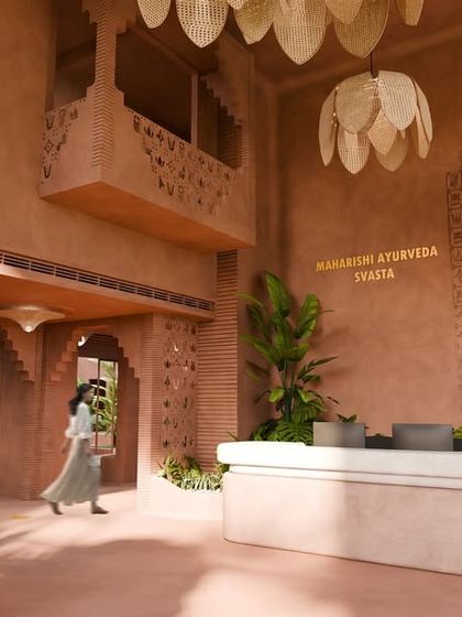 As guests move through the reception area, the terracotta walls and soft light calm the senses. Every detail is designed to ground the spirit and welcome guests home.