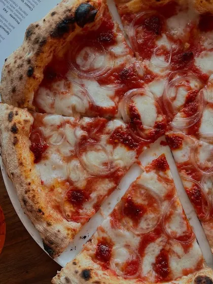 Our Goan Sausage pizza is a whole vibe. We pair it with a crisp Aperol Spritz for that perfect balance of spicy, smoky, and refreshing. It's a flavour punch that hits all the right notes.