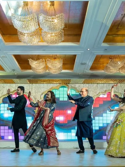 A full family performance with multiple generations on stage. These are the moments that truly define the "shaadi ka ghar" feeling.