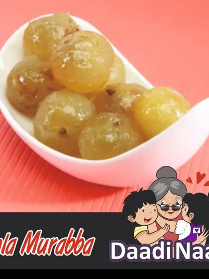A simple, clean shot of our classic Amla Murabba. These glossy, syrup-soaked gooseberries are a powerhouse of taste and health, a true traditional Indian superfood.