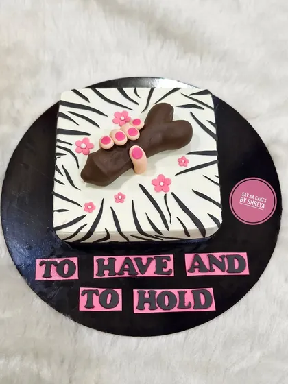 A cake that's all about what's "to have and to hold." This is another one of my popular adult-themed designs, perfect for a bachelorette party with a wild side and a great sense of humor.