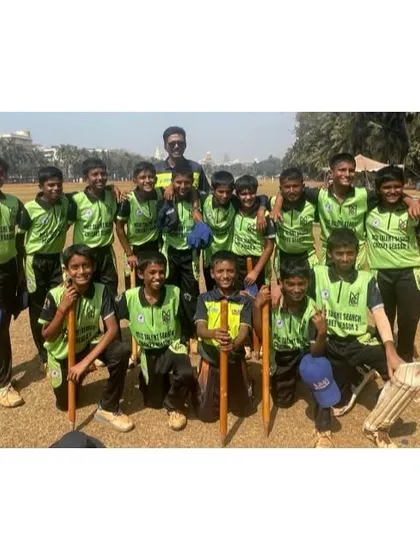 Our U-12 team, champions of the MCC Cricket Tournament, posing proudly with their medals and trophy.