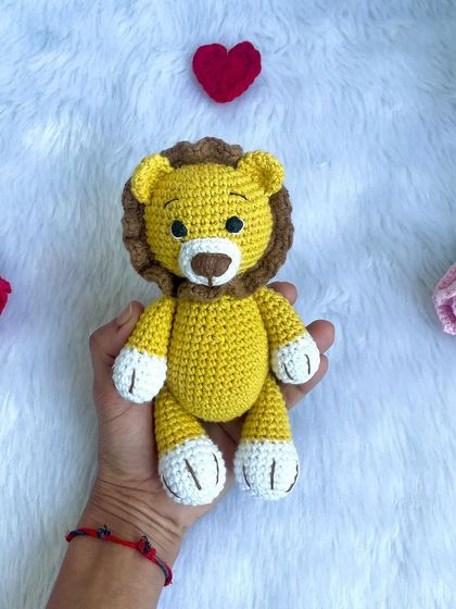 A classic yellow lion, perfect for cuddling. This design is one of my bestsellers and can be personalized with initials upon request.