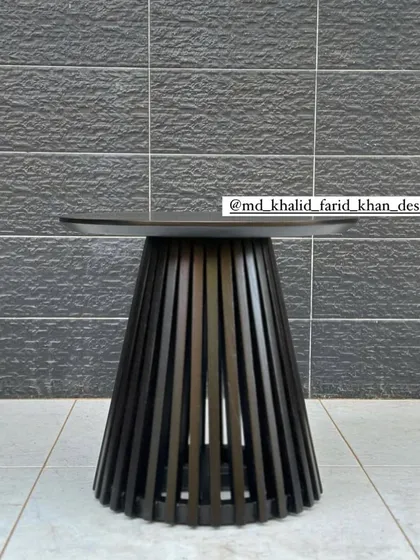 The black slatted side table.
