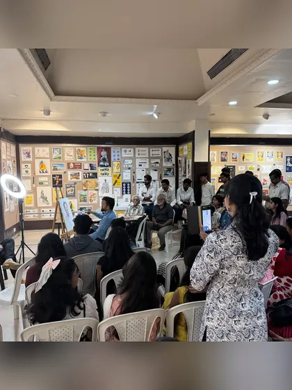 A full view of the demonstration setup at Abhinav Kala Mahavidyalaya, Pashan. It was a special honor to paint my college mentor, Dr. Sanjay Bharti.