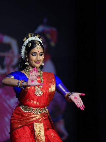 A stunning solo moment from the Kuchipudi performance, highlighting the dancer's expressive eyes and precise hand mudras.