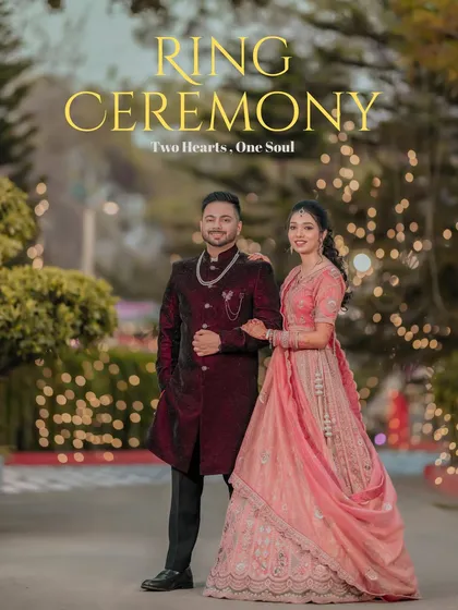 A classic couple portrait of Alankrit and Parul at their ring ceremony, with beautiful bokeh lights in the background, creating a romantic and festive mood.