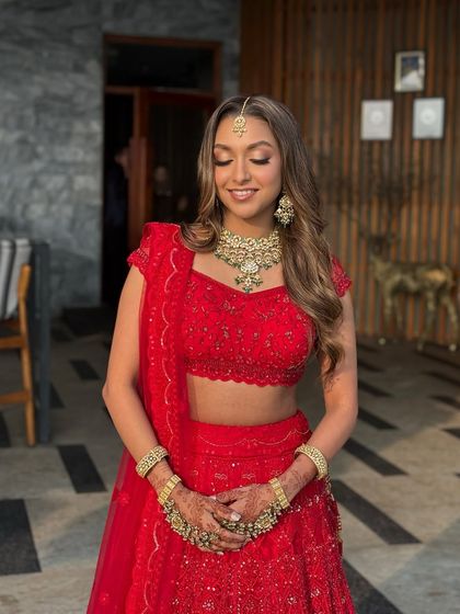 The bride, Rhea, looking radiant and happy. Her makeup is a perfect example of my signature style: glowing skin, soft smokey eyes, and a lip color that enhances her natural tone, all coming together for a flawless bridal look.