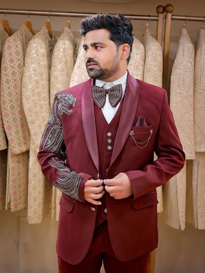 A final look at the complete outfit, showing the detailed embroidery on the sleeve.