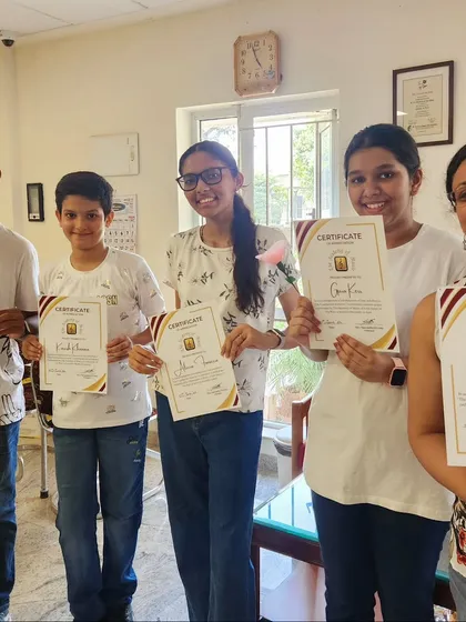 More happy faces and well deserved certificates. These students represent a mix of our vocal, keyboard, and guitar programs, coming together to form a cohesive band.