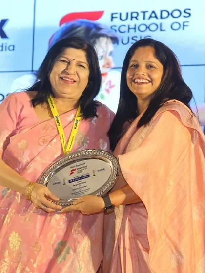 A moment of recognition at the Eldrok Indore Summit. These events are vital for building the partnerships that bring quality music programs to more schools.