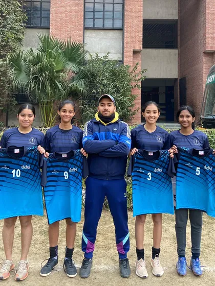 A moment of pride for our coaching staff. Ayushi, Tanya, Navya, and Angelin from our academy, all selected for the Delhi U17 team, holding their official jerseys.