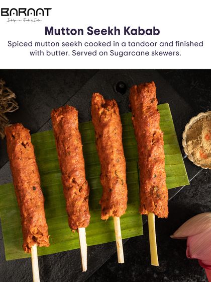 These Mutton Seekh Kebabs are cooked in a traditional tandoor and finished with butter, served on unique sugarcane skewers for a hint of sweetness.