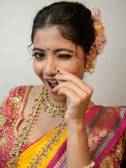 A playful wink from the bride, showing how comfortable and confident she feels.