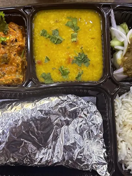 A customized thali with kadai paneer and yellow dal. I can always swap the dal makhni for a lighter dal if you prefer.