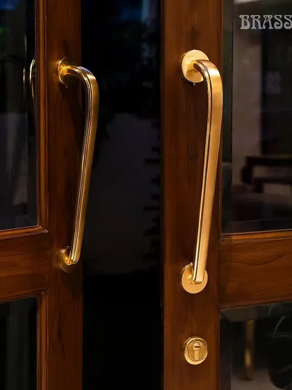 The Agatha Door Pull on rose, offering a more minimalist mounting option. This version is perfect for modern doors where a full backplate is not desired.