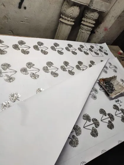 This custom back panel was made by Thikri artisans in Udaipur. We first met the lead artisan in 2014 and were thrilled to finally collaborate on a piece that brings this ancient glasswork technique into a contemporary space.