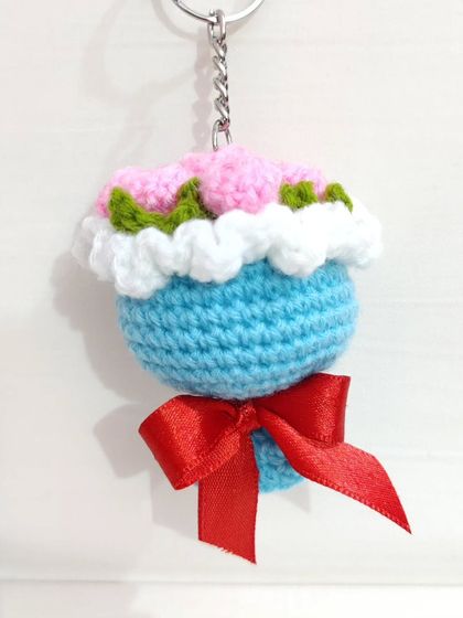 My most popular item, the mini bouquet keychain. I create these in various flower types like roses and sunflowers, and in a wide range of color combinations.