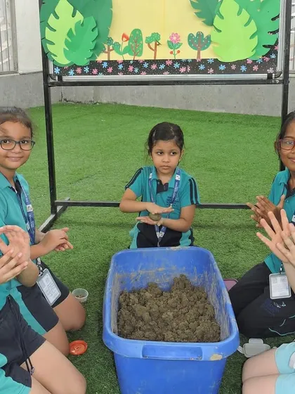Students work together during our Seed Week activities. These collaborative projects foster teamwork and a shared sense of responsibility for our planet.