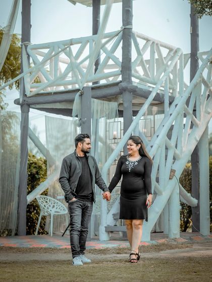 A sweet and simple walking shot, capturing the couple hand-in-hand during their pre-wedding session.