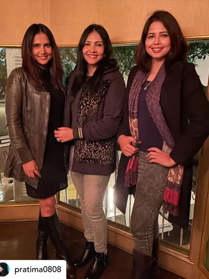 Friends gathering to celebrate a birthday in our elegant indoor dining area, sharing smiles and creating memories.