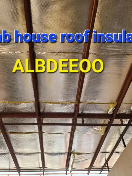 A look at the underside of a roof with insulation installed. We use reflective insulation sheets to block radiant heat, keeping the interior cool and comfortable.