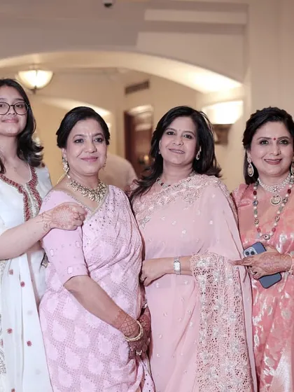 The lovely family all together. It was a joy to do the makeup for the groom's mother and aunts, ensuring each of them felt beautiful and confident.