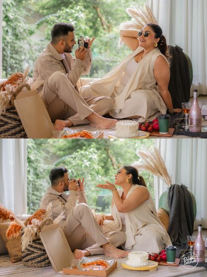 A diptych of playful moments from an indoor picnic. This pairing shows the fun and loving dynamic of the couple, from taking photos of each other to blowing kisses.