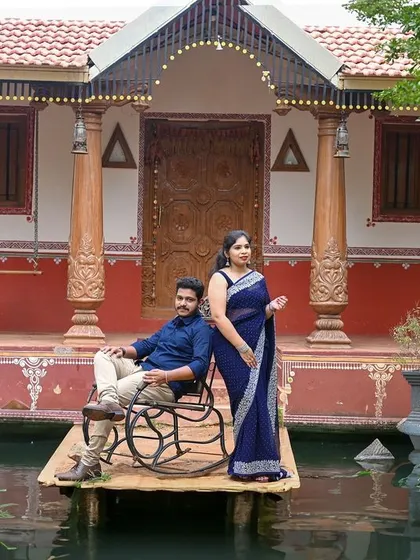 This South Indian village set even includes a small pond, adding another beautiful element to this traditional pre-wedding photoshoot.
