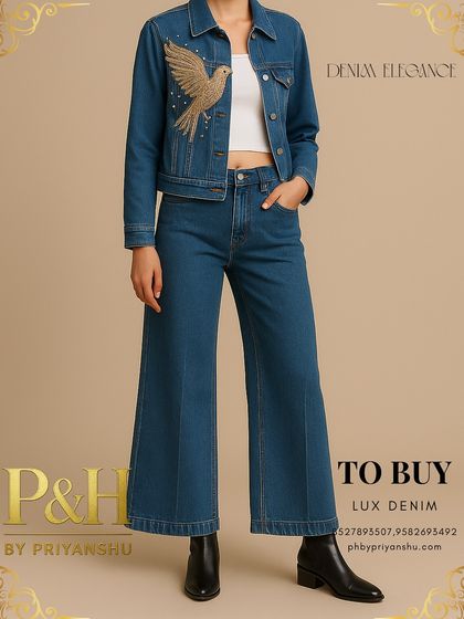 A detailed view of the golden bird denim set, focusing on the jacket and the clean lines of the wide-leg jeans.