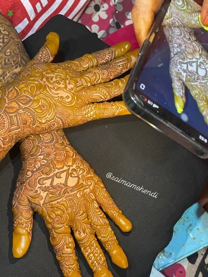 Here I'm matching the design to a reference photo provided by the client, including the custom initials 'TL'. I always aim to bring your exact vision to life.