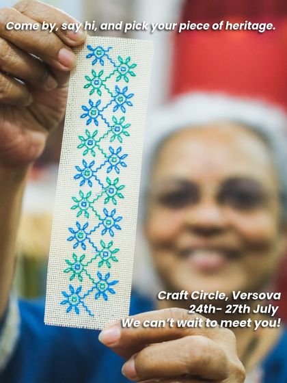 Holding up a handmade Kasuti bookmark, a piece of heritage you can create with your own hands. This was for an event at Craft Circle, Versova, where I shared the story of Kasuti.