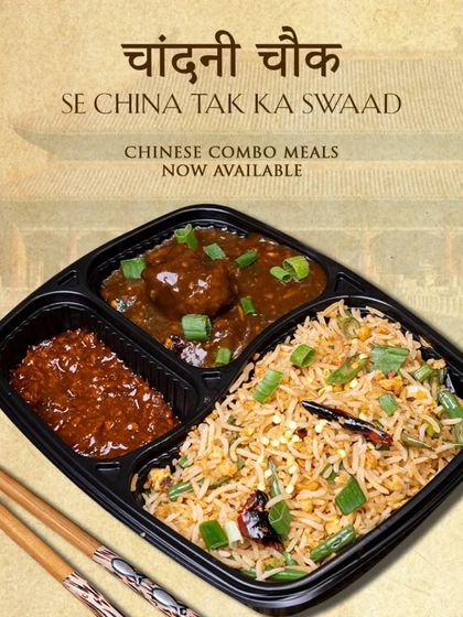From Chandni Chowk to China, our Chinese combo meals are now available. This image shows a complete meal of fried rice, manchurian, and schezwan sauce.