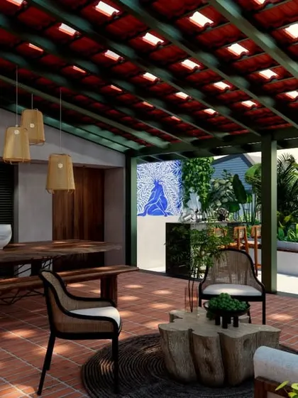 We believe in dissolving the lines between indoors and outdoors. This landscaped terrace for HAUS 5 in Bengaluru features a traditional Mangalore tile roof, brick flooring, and a custom live-edge table, creating a tropical yet modern space for relaxation and work.