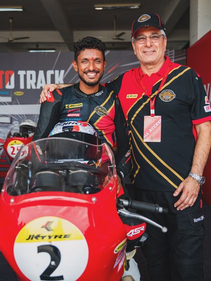 A moment of mentorship with Aspi Bhathena, a legend in Indian motorsport, during the GT Cup. We believe in learning from the best.