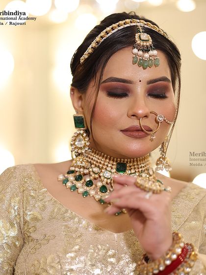 Creating a harmonious look with a gold outfit can be tricky. I teach how to use warm, earthy tones and smokey eyes to complement a golden bridal look.