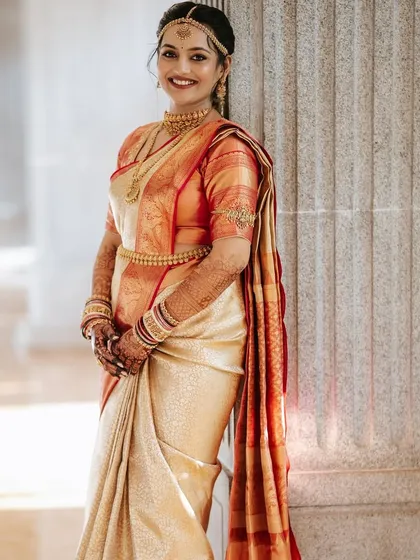 The bride's smile lights up the frame in this classic portrait.