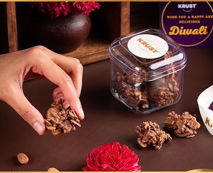 Our Almond Milk Rochers, featuring roasted almonds coated in rich milk chocolate. A classic and irresistible treat for Diwali gifting.
