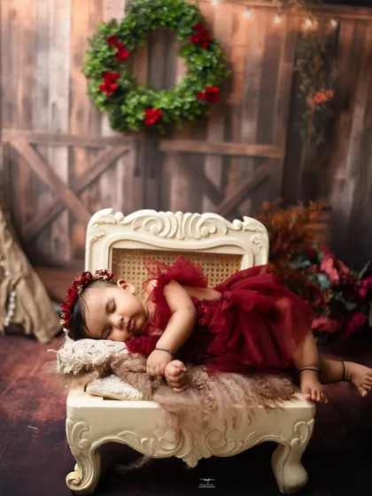A sleeping beauty rests on a vintage chair. I always work around the baby's schedule, capturing beautiful shots whether they are awake or asleep.