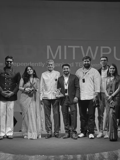 On stage with fellow speakers at a TEDxMITWPU event. These platforms allow me to connect with inspiring individuals from different fields.