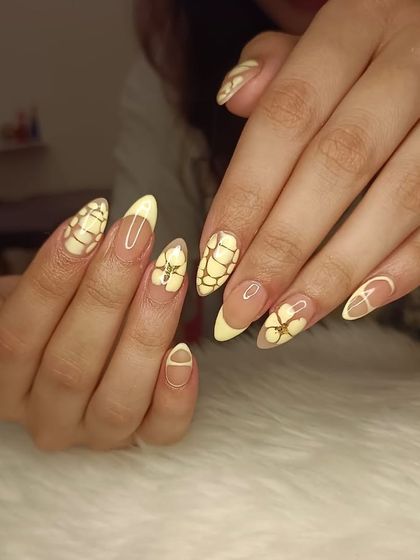 Another view of the unique textured yellow birthday nails.