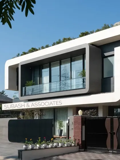 This view of Residence 100 shows how the design breaks from trends, focusing instead on creating a timeless structure with a distinct personality.