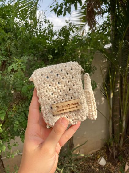 This is our two-sectioned mini wallet, perfect for keeping your cash and cards separate. It's a compact and stylish alternative to a bulky purse.