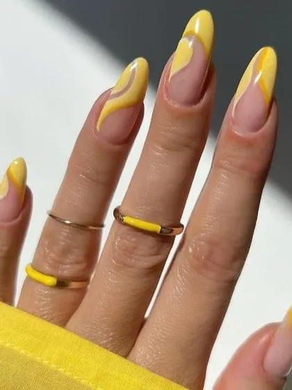 A sunny and cheerful design with abstract yellow swirls on a neutral base. This look is perfect for summer or anytime you want to add a pop of color to your style.